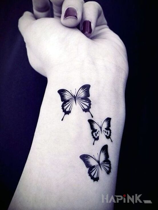 Tattoo Trzy motyle in butterflies motif on the wrist