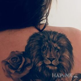 Tattoo Cover of a failed tattoo on the shoulder blades style: realistic