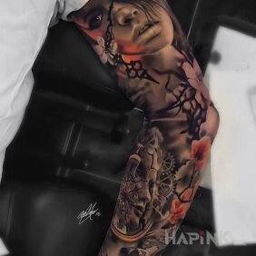 Tattoo Women's faces on the upper arm motif: 3D style: realistic