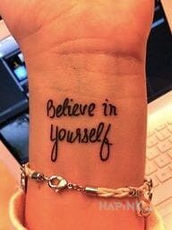 Tattoo Uwierz w siebie in lettering motif on the wrist