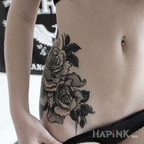 Tattoo Black and gray flowers on the ribs motif: flowers