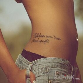 Tattoo Inscription on the side on the ribs motif: lettering