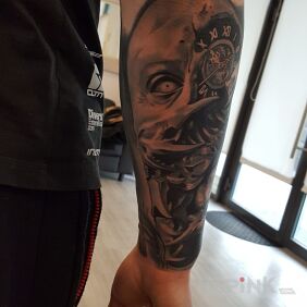 Tattoo Time Devourer Part 2 on the forearm motif: demons