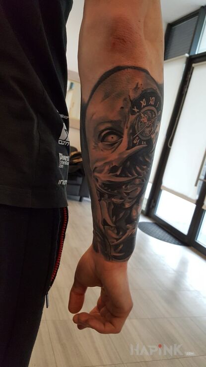 Tattoo Pożeracz czasu część 2 in 3D motif on the forearm