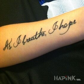 Tattoo Hope on the forearm motif: lettering