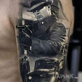 Tattoo Gangster on the upper arm motif: characters style: realistic