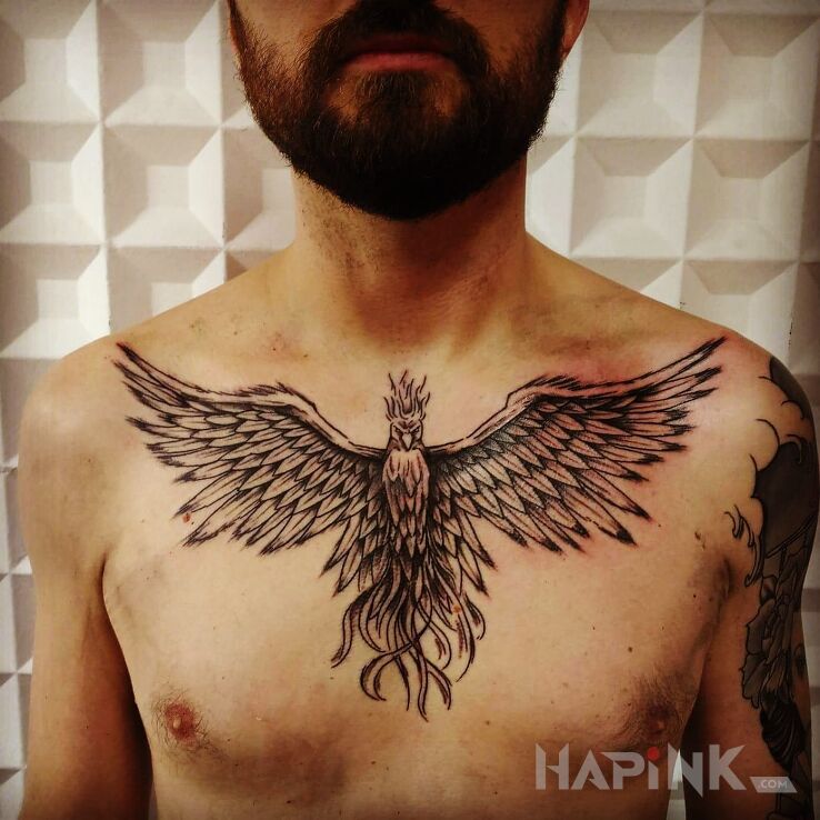 Tattoo Feniks in animals motif on the chest