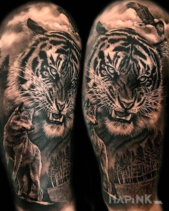 Tattoo Tygrys i wilk in 3D motif and realistic style on the upper arm