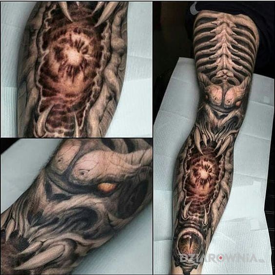 Tatuaż demon w motywie rękawy na ramieniu