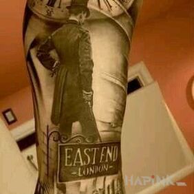 Tattoo English elegance on the upper arm motif: 3D style: realistic