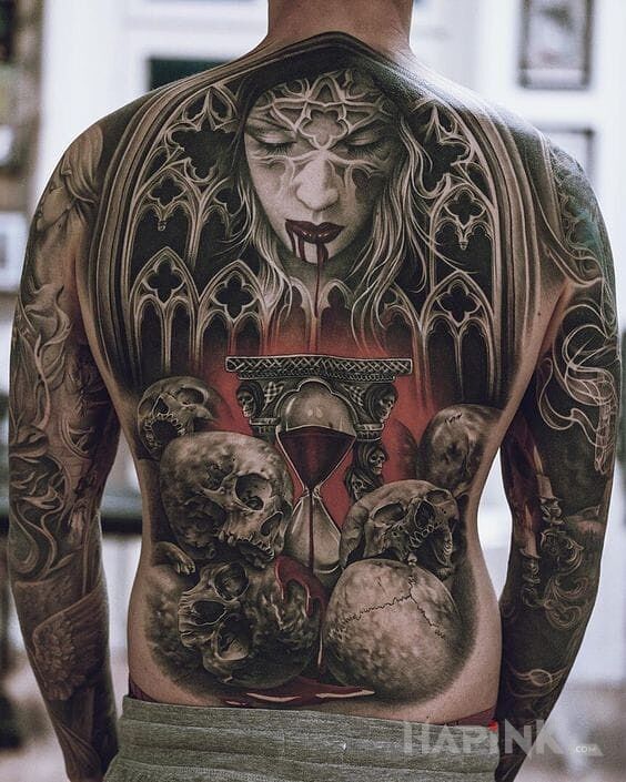 Tattoo Krwawa klepsydra in demons motif and realistic style on the back