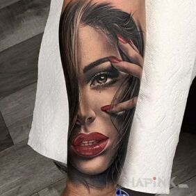 Tattoo Red lips on the forearm motif: colorful style: realistic