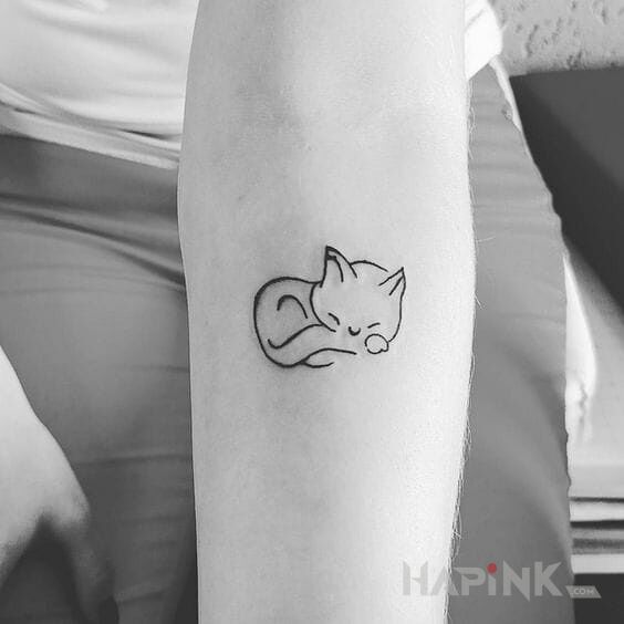 Tattoo Kicia in animals motif on the forearm