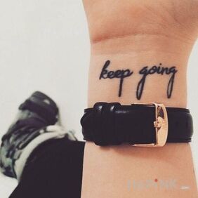 Tattoo Keep going on the wrist motif: lettering