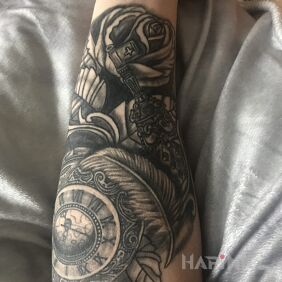 Tattoo Cos on the forearm motif: objects