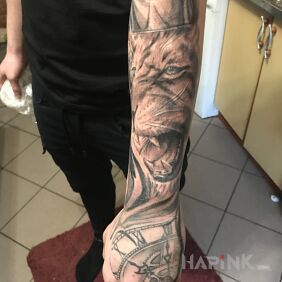 Tattoo Lion on the hand motif: animals style: realistic