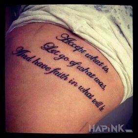 Tattoo Inscription with a message on the ribs motif: lettering
