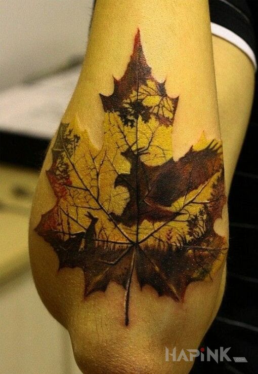 Tattoo Zwierzęta i liść in animals motif on the forearm