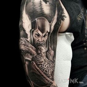 Tattoo Thor on the upper arm motif: characters style: realistic