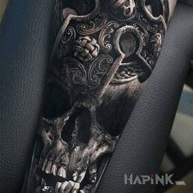 Tattoo Dark skull on the forearm motif: 3D style: realistic