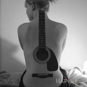 Tattoo Guitar playing on the back motif: other