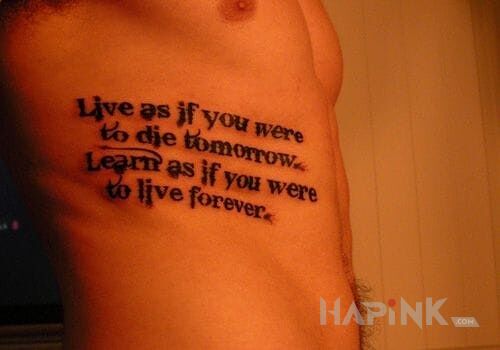 Tattoo Odnośnie życia in lettering motif on the ribs