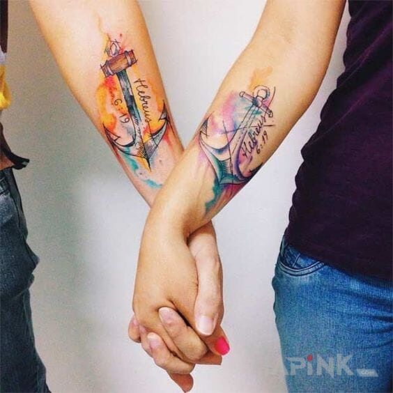 Tattoo Kotwice in Love motif on the forearm