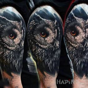 Tattoo Owl on the upper arm motif: animals style: realistic