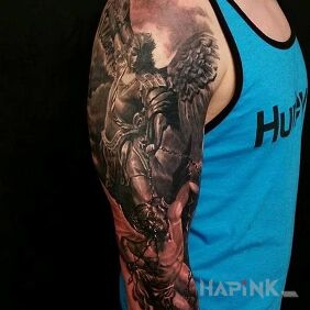 Tattoo Fighting the demon on the forearm motif: angels