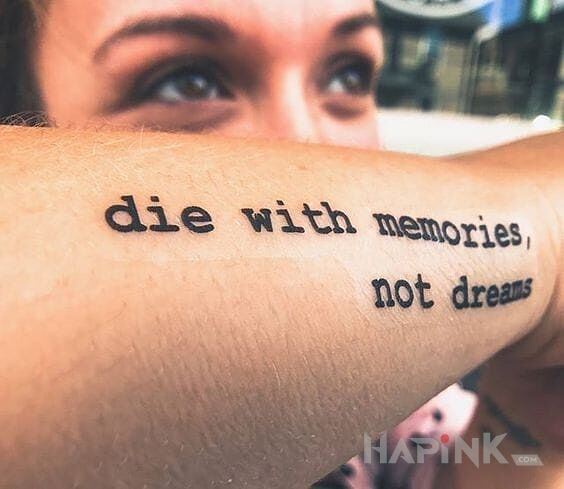 Tattoo Wspomnienia in lettering motif on the forearm