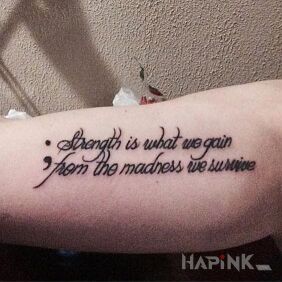 Tattoo About our strength on the upper arm motif: lettering