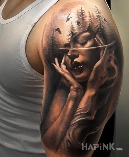 Tattoo Zamyślona kobieta in 3D motif and realistic style on the upper arm
