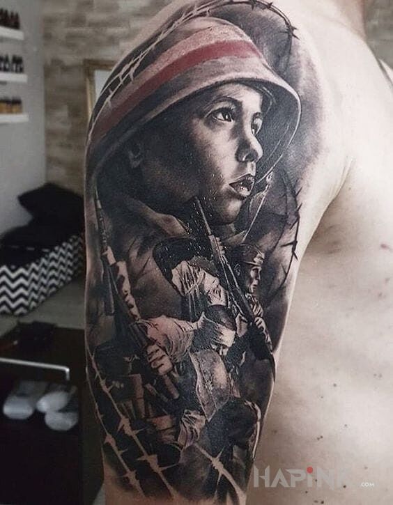 Tattoo Powstaniec in faces motif and realistic style on the upper arm