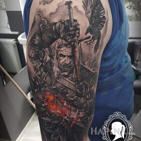 Tattoo The Witcher. White Wolf on the upper arm motif: animals