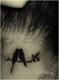 Tattoo Gołąbeczki in animals motif on the nape
