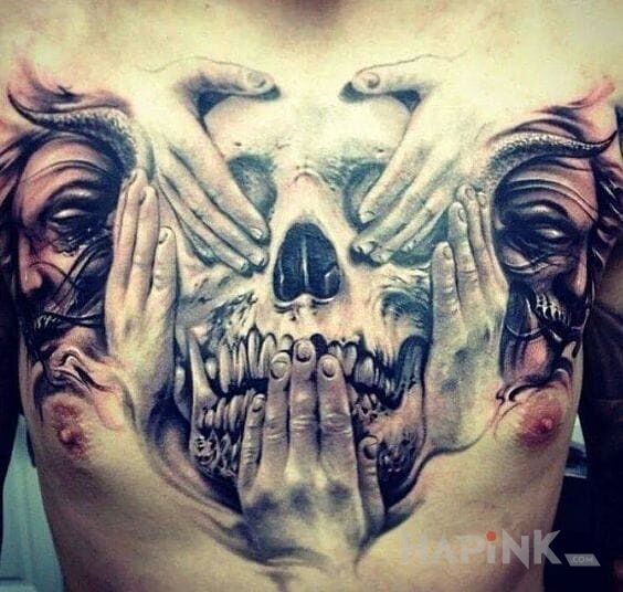 Tattoo Czaszka i dwie twarze in faces motif and realistic style on the chest