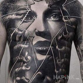 Tattoo Behind the glass on the chest motif: faces style: realistic