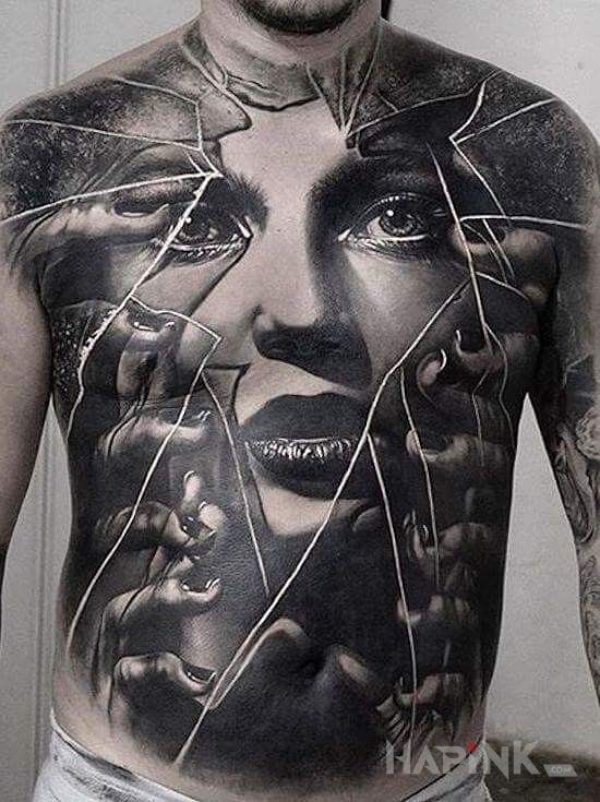 Tattoo Za szkłem in faces motif and realistic style on the chest
