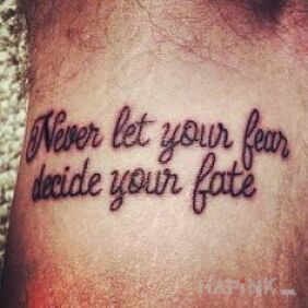 Tattoo Fear and faith on the wrist motif: lettering