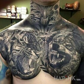 Tattoo Tiger vs. wolf on the chest motif: animals style: realistic