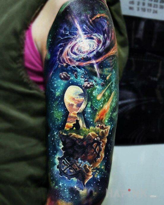 Tattoo Dziurka od klucza in characters motif and realistic style on the upper arm