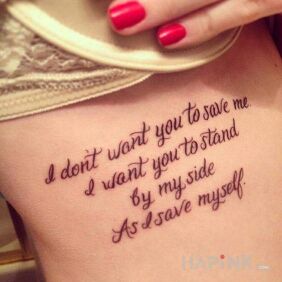 Tattoo In English on the ribs motif: lettering