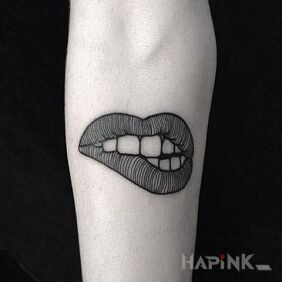 Tattoo Bitten lips on the forearm motif: other