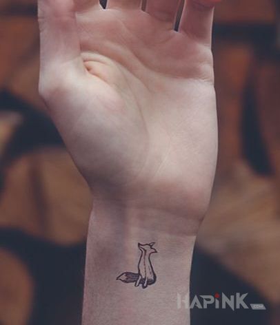 Tattoo Lisek in animals motif on the wrist