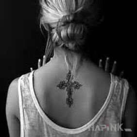 Tattoo Cross on the back motif: religious