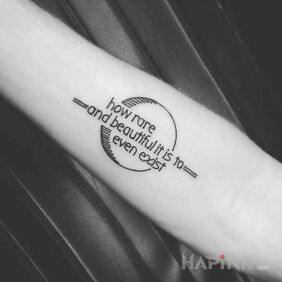 Tattoo Existence on the forearm motif: lettering