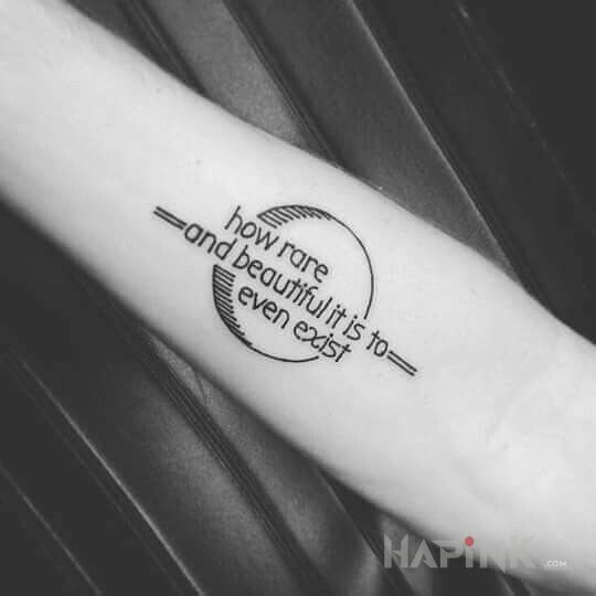 Tattoo Istnienie in lettering motif on the forearm