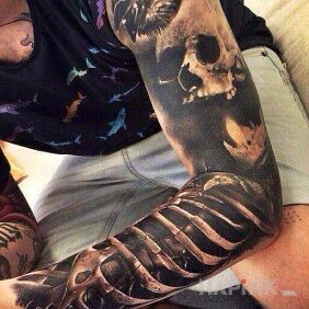 Tattoo Bone sleeve on the forearm motif: 3D style: realistic