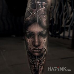 Tattoo Eyes closed on the calf motif: 3D style: realistic