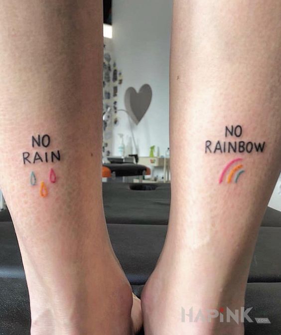 Tattoo Tęcza in lettering motif on the calf